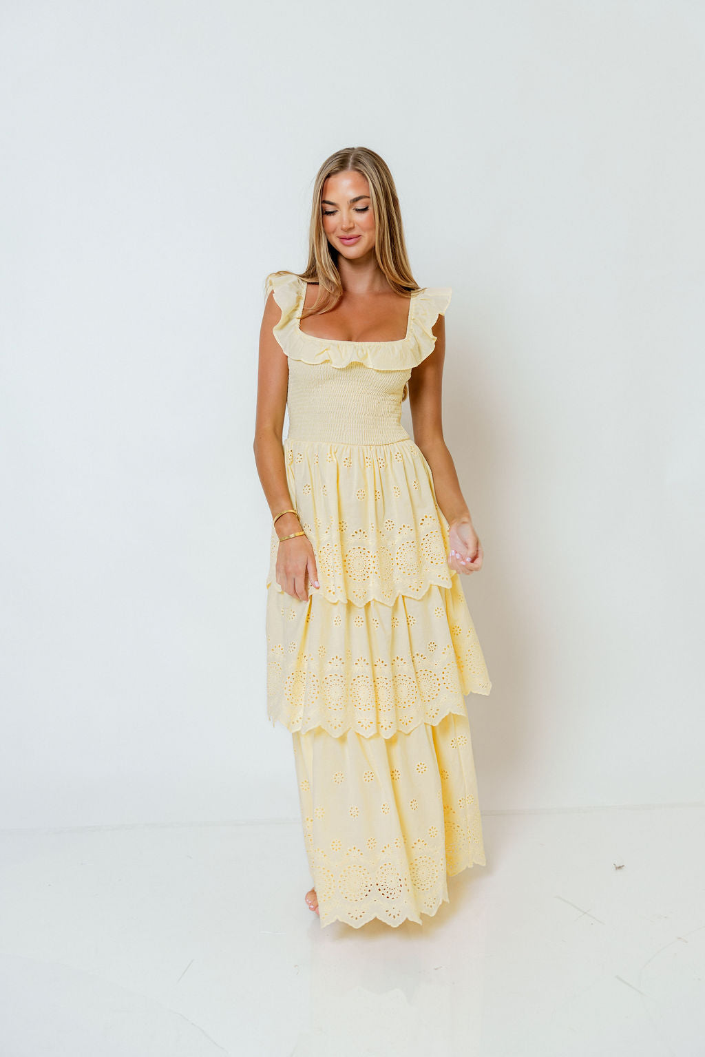 Ashlynn Ruffled Smocked Eyelet Tiered Maxi Dress in Yellow